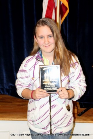 Arianna Reiley receives an award at the Clarksville Kiwanis Club's Memories of Service and Sacrifice Project's "Interview a Veteran" essay contest. Arianna Reiley receives an award at the Clarksville Kiwanis Club's Memories of Service and Sacrifice Project's "Interview a Veteran" essay contest.