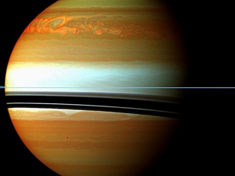 This false-color mosaic from NASA's Cassini spacecraft shows the tail of Saturn's huge northern storm. (Image credit: NASA/JPL-Caltech/Space Science Institute)