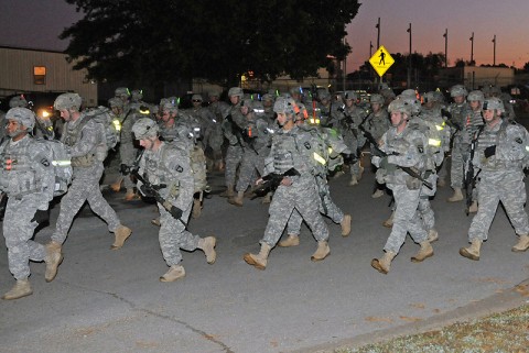 Soldiers from 1st Brigade Combat Team, 101st Airborne Division, set off on their 20 km ruck march as one of the final events for the Fire Support Team Certification Oct. 21st outside the brigade headquarters. (Photo by Sgt. Jon Heinrich)