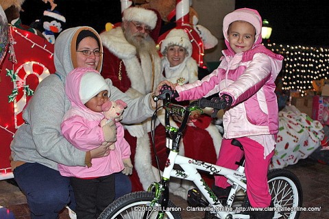 A young girl visiting with Santa Claus at Christmas on the Cumberland 2010.