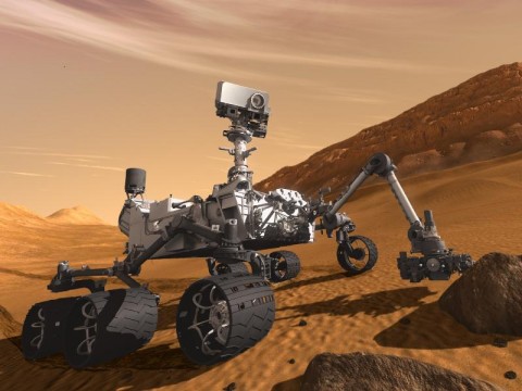 This artist concept features NASA's Mars Science Laboratory Curiosity rover, a mobile robot for investigating Mars' past or present ability to sustain microbial life. (Image credit: NASA/JPL-Caltech)