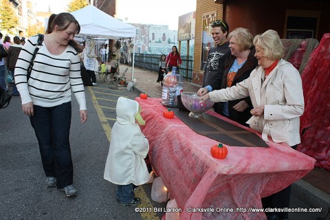 Mary Nell Wooten hands out candy for the Roxy Regional Theatre at Fright on Franklin Street