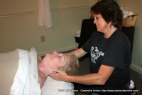 Tina Ellis works on Sue Culverhouse’s neck during her massage