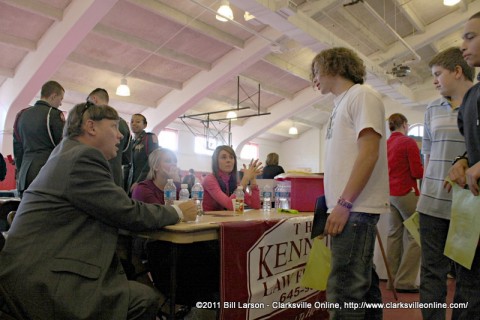 Attorney Kevin Kennedy from the Kennedy Law Firm talks with a student