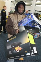 A very happy Black Friday shopper at Best Buy