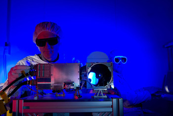 Roger Wiens, left, of Los Alamos National Laboratory and principal investigator of the Mars Science Laboratory mission’s ChemCam team, checks out the ChemCam instrument at Los Alamos before the launch. Roger Wiens, left, of Los Alamos National Laboratory and principal investigator of the Mars Science Laboratory mission’s ChemCam team, checks out the ChemCam instrument at Los Alamos before the launch.