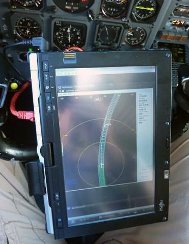 This is a pilot's eye view of the display from the Airborne Topographic Mapper developed by NASA's Wallops Flight Facility that allowed the DC-8 pilots to fly the exact route flown previously in earlier IceBridge missions, assuring that data collected can be compared to the previous years. (NASA /Dick Ewers)