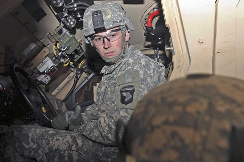 Pvt. Blake Salvey, a squad automatic weapon gunner with Company D, 2nd Battalion, 327th Infantry Regiment, 1st Brigade Combat Team, 101st Airborne Division, starts the ignition for Medium Tactical Vehicle Replacement Mine-Resistant Ambush Protected vehicle during a driver certification class Nov. 17th, outside their battalion here. (Photo by Sgt. Richard Daniels Jr.)