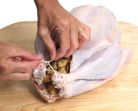 Stuffing A Turkey (RecipeTips.Com)