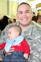 A soldier reunited with his infant son