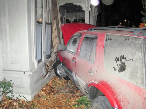 97 GMC Jimmy crashed into a building on Greenwood Avenue. (Photo by CPD Officer-Tom Tranberg)