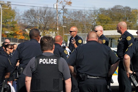 Briefing for special operation. (Photo by CPD-Jim Knoll)