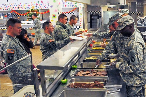 Command staff of 2nd Brigade Combat Team, 101st Airborne Division (Air Assault), serve Thanksgiving Dinner to Soldiers of Strike Brigade at the brigade’s dining facility at Fort Campbell, KY, Nov. 22nd. Soldiers and family members came together at the DFAC to enjoy a hot meal and live music while celebrating the holiday season. (U.S. Army Photo By Spc. Shawn Denham, PAO, 2nd BCT, 101st Abn. Div.)