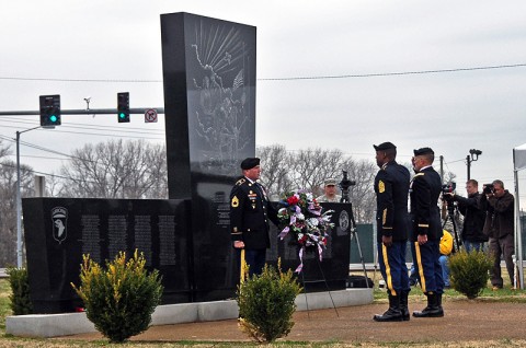 Col. Dan Walrath, commander, 2nd Brigade Combat Team, 101st Airborne Division (Air Assault) and Command Sgt. Major Alonzo Smith, command sergeant major, 2nd BCT, salute at Fort Campbell’s monument to the Gander tragedy during the annual remembrance ceremony, The names of the 248 Screaming Eagle Soldiers who died in the crash of Arrow Airlines flight 1285, December 12th, 1985, are etched into the face of the monument. (U.S. Army photo by Sgt. Joe Padula, 2nd BCT PAO, 101st Abn. Div.) Col. Dan Walrath, commander, 2nd Brigade Combat Team, 101st Airborne Division (Air Assault) and Command Sgt. Major Alonzo Smith, command sergeant major, 2nd BCT, salute at Fort Campbell’s monument to the Gander tragedy during the annual remembrance ceremony, The names of the 248 Screaming Eagle Soldiers who died in the crash of Arrow Airlines flight 1285, December 12th, 1985, are etched into the face of the monument. (U.S. Army photo by Sgt. Joe Padula, 2nd BCT PAO, 101st Abn. Div.)