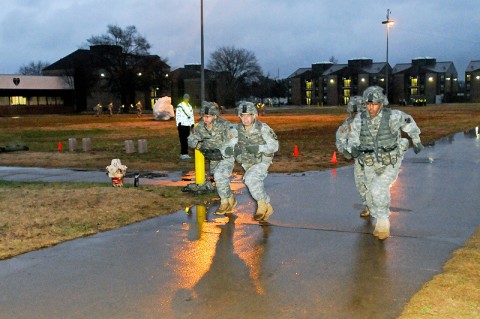 Soldiers of Company A, 2nd Brigade Special Troops Battalion, 2nd Brigade Combat Team, 101st Airborne Division (Air Assault), start the first 800-meter run during Strike Iron Challenge at Fort Campbell, KY, Dec. 15th. The competition was modified to contain most of the events in a smaller area while increasing the amount of running between each event, increasing the physical difficulty. (U.S. Army Photo By Spc. Shawn Denham, PAO, 2nd BCT, 101st Abn. Div.)