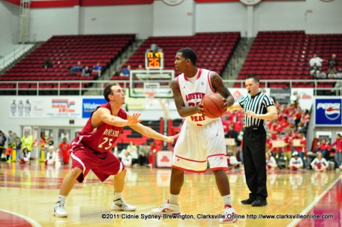 Melvin Baker sets up the half court offense during Austin Peay's win over Rochester. Baker ended the game with 10 points.