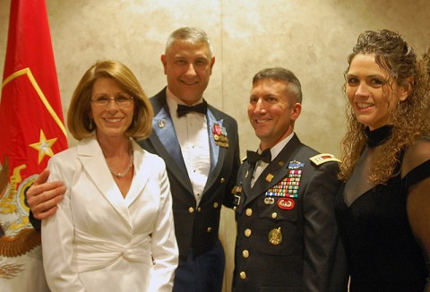 From left to right Mrs. Jeanne Chandler, Sgt. Maj. of the Army Raymond F. Chandler III, Capt. Steven M. Gerber, commander, Gulf Company, 626th Brigade Support Battalion, 3rd Brigade Combat Team, 101st Airborne (Air Assault) and Miss Jennifer Turpin, gather for photo. (Photo by Staff Sgt. David Reiley)