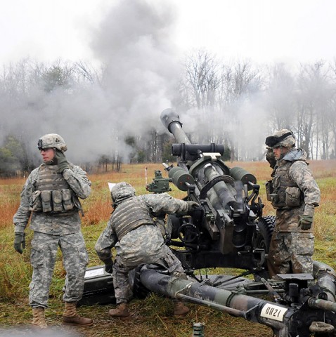 Section 1, Battery B, 2nd Battalion, 320th Field Artillery, conduct a fire mission Dec. 6th in Fort Knox, KY. (Photo by Sgt. Jon Heinrich)