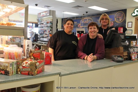 The friendly staff at the Woodlawn Papa Rock Travel Center