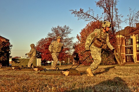 Capt. Michael Gold, commander, Company C, 1st Squadron, 75th Cavalry Regiment, 2nd Brigade Combat Team, 101st Airborne Division (Air Assault), pulls a loaded medical liter in full combat gear across Strike Field while taking the Iron Strike Combat Physical Fitness Test, Nov. 10th. The ISCPFT is designed to better prepare Strike Soldiers for future combat operations. (U.S. Army photo by Sgt. Joe Padula, 2nd BCT PAO, 101st Abn. Div.)