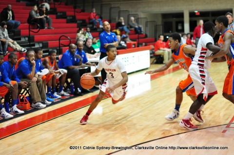 Rossview High School's Chris Williams is driving against Hunters Lane in the Hawks' 64-43 loss Thursday night.