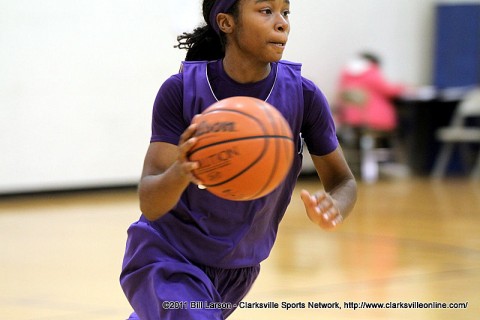 Tiasha Gray brings the ball up the court during practice.