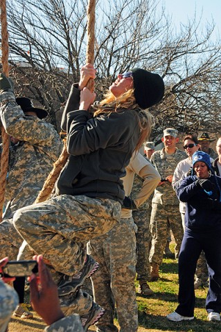 Sasha Stone, wife of 1st Sgt. Nathan Stone, with Troop A, 1st Squadron, 75th Cavalry Regiment, 2nd Brigade Combat Team, 101st Airborne Division (Air Assault), climbs a rope during the squadron’s ‘Spouse Spur Ride’ at Fort Campbell, KY, Nov. 18th. Spouses went through multiple challenges such as an obstacle course and weapons familiarization to build bonds between themselves and their husbands. (U.S. Army Photo By Spc. Shawn Denham, PAO, 2nd BCT, 101st Abn. Div.) Sasha Stone, wife of 1st Sgt. Nathan Stone, with Troop A, 1st Squadron, 75th Cavalry Regiment, 2nd Brigade Combat Team, 101st Airborne Division (Air Assault), climbs a rope during the squadron’s ‘Spouse Spur Ride’ at Fort Campbell, KY, Nov. 18th. Spouses went through multiple challenges such as an obstacle course and weapons familiarization to build bonds between themselves and their husbands. (U.S. Army Photo By Spc. Shawn Denham, PAO, 2nd BCT, 101st Abn. Div.)
