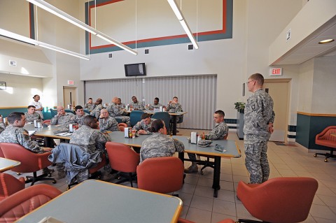 U.S. Army Spc. Stephen R. Harmon from Troop B, 1st Squadron, 61st Cavalry Regiment, 4th Brigade Combat Team, 101st Airborne Division, and native of Charleston, SC, shares his opinions about the 4th BCT Dining Facility's new breakfast to-go area during the 4th BCT Dining Facility's council meeting, Jan. 19th, 2012 at Fort Campbell, KY. (Photo by Sgt. Kimberly Menzies)