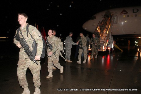 A 159th Combat Aviation Brigade Soldier breaks into a smile as he heads for the hangar and a chance to see his family