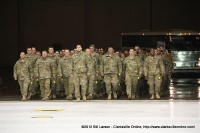 The soldiers march into the hangar The soldiers march into the hangar