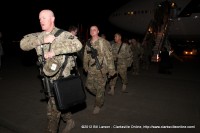 The returning soldiers head for the hanger