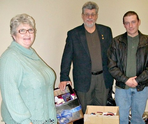 Planters Bank employees and customers recently donated several boxes of clothing and personal care items for women going through the Life Center Foundation’s Phoenix Program. Pictured from left to right are Jan Greene, Planters Bank branch manager; Bill Irby, Life Center Foundation founder; and David Adler, Phoenix Program director