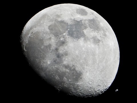 The International Space Station can be seen as a small object in lower right of this image of the moon in the early evening Jan. 4th in the skies over the Houston area flying at an altitude of 390.8 kilometers (242.8 miles). (Photo credit: NASA) The International Space Station can be seen as a small object in lower right of this image of the moon in the early evening Jan. 4th in the skies over the Houston area flying at an altitude of 390.8 kilometers (242.8 miles). (Photo credit: NASA)