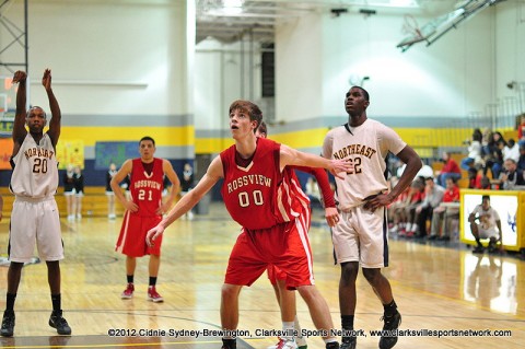 Rossview's Kyle Weldon (00) boxes out Northeat's Alex Poythress (22) during a free-throw attempt in a District 10-AAA game on Jan. 24th, 2012