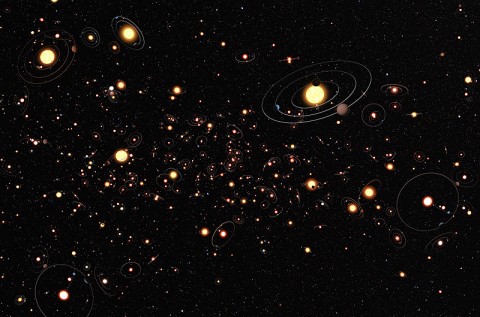 This artist's illustration gives an impression of how common planets are around the stars in the Milky Way galaxy. The planets, their orbits, and their host stars are all vastly magnified compared to their real separations. A six- year search that surveyed millions of stars using the microlensing technique concluded that planets around stars are the rule rather than the exception. The average number of planets per star is greater than one. (Image credit: NASA/ESA/ESO)