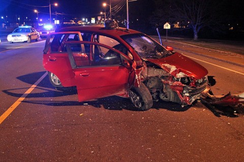 2009 Pontiac G-3 Hatchback stuck a utility pole on Madison Street Monday night. (Photo by CPD-Jim Knoll)