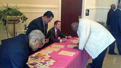 Senator Tim Barnes and Pastor Tommy Vallejos assist members of First Missionary Baptist Church in registering to vote. Senator Tim Barnes and Pastor Tommy Vallejos assist members of First Missionary Baptist Church in registering to vote.
