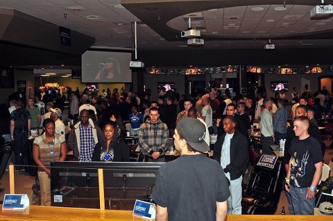 Fort Campbell, KY - Soldiers from Fort Campbell and the 2nd Brigade Combat Team, 101st Airborne Division (Air Assault), stand as vocal artist Kelly Clarkson sings the National Anthem during Superbowl XLVI, Feb. 5th. The Soldiers watched the game at Fort Campbell Morale, Welfare and Recreation’s The Zone, which offered food, beverages, large TV screens and prizes for its patrons. (U.S. Army photo by Sgt. Joe Padula, 2nd BCT PAO, 101st Abn. Div.)