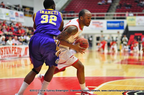 John Fraley drives around Tennessee Tech's Bassey Inameti towards the basket Thursday night. Fraley had a 31 point career performance. He also grabbed  17 rebounds. Austin Peay Men's Basketball.