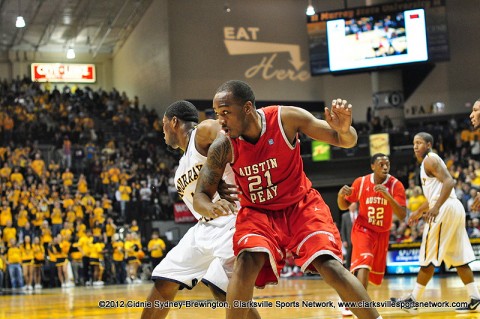 John Fraley posts up under the rim Saturday night. Fraley ended the night with 13 points and 8 rebounds. Austin Peay Men's Basketball.