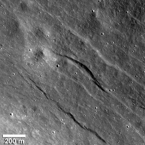 This shows the largest of the newly detected graben found in highlands of the lunar farside. The broadest graben is about 500 meters (1,640 feet) wide and topography derived from Lunar Reconnaissance Orbiter Camera (LROC) Narrow Angle Camera (NAC) stereo images indicates they are almost 20 meters (almost 66 feet) deep. (Credit: NASA/Goddard/Arizona State University/Smithsonian Institution)