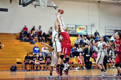 Janie White goes up for a backwards rebound over Mt. Juliet. Mt. Juliet beat Rossview 68-38 in the second night of the women's 5-AAA Region Tournament.
