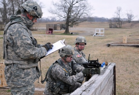 Specialist Rodney C. Wall, training room clerk with Headquarters and Headquarters Company, 1st Brigade Combat Team, 101st Airborne Division, aims down the sights of his M320 grenade launcher module Feb. 8 at Range 22B here. The range was held by Company C, 1st Special Troops Battalion, 1st BCT. (U.S. Army/Sgt. Jon Heinrich, 1st Brigade Combat Team, 101st Airborne Division (Air Assault).)