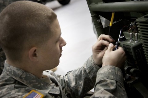 Spc. Morris Morley of the the 101st Airborne Division helps test the new digitized M119A2 howitzer technical manual during the second phase of the operator logistics demonstration at Picatinny Arsenal, N.J., Jan. 18, 2012. (Erin Usawicz)