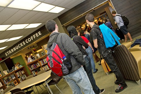 Students wait in line for the newly opened Starbucks coffee shop inside the APSU Woodward Library. (Photo by Amber Fair/APSU)