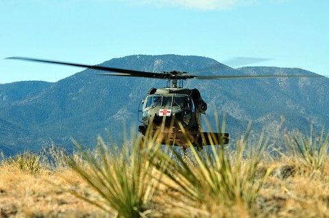 A UH-60 Black Hawk medevac helicopter with Task Force Eagle Assault, 101st Combat Aviation Brigade, 101st Airborne Division, lifts front wheels off the ground during a rolling takeoff on a confined hilltop at Fort Carson, CO during Task Force Eagle Assault's rotation to high altitude mountainous environment training, Feb. 20th, 2012. (Photo by Sgt. Duncan Brennan)