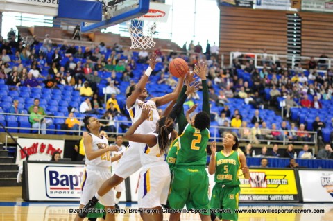 Bashaara Graves and Sierra Rozar have each others' back under the basket for a rebound. Clarksville High School Girls Basketball advances to the State Semifinals with 64-48 win over Memphis Central High School, the defending State Basketball Champs!