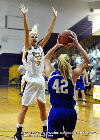 Chandler Cooper does her best to block a Brentwood pass. After the 55-34 win over Brentwood, the Lady Wildcats have made it to the Class AAA State Tournament for the third straight year.