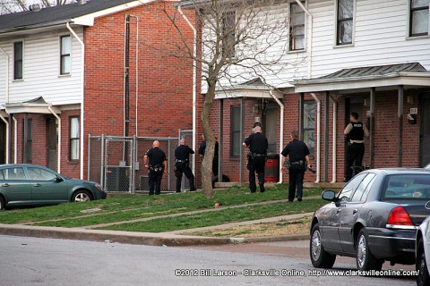 Clarksville Police Officers surround an apartment on Ladd Street were robbery suspect Justin Horstead was hiding out.