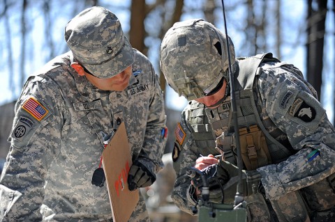 U.S. Army 1st Lt. Andrew D. Sivanich, the executive officer for Company E, 2nd Battalion, 506th Infantry Regiment, 4th Brigade Combat Team, 101st Airborne Division, conducts the 'filling' of a radio task portion of the Expert Infantryman Badge testing on March 5th, 2012 at Fort Campbell, KY. The Expert Infantryman Badge testing consists of 37 tasks that include the Army Physical Fitness Test, land navigation, individual's weapon qualification, 30 individual soldier tasks and a 12-mile foot march. (Photo by Staff Sgt. Todd Christopherson)